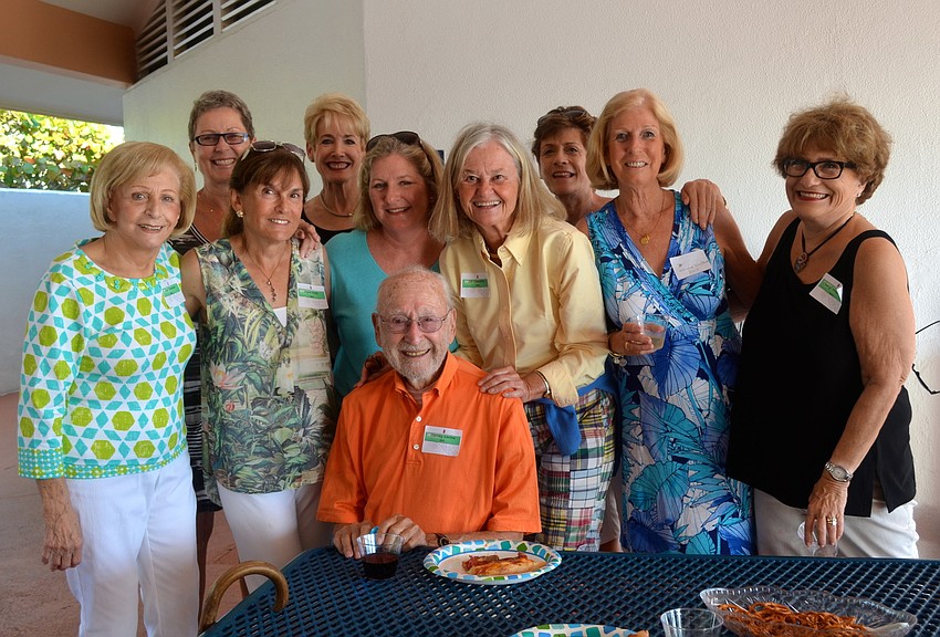 The ladies of Winding Oaks pose with Harvey Levine, 93, who will soon be moving from the community to Bradenton.
