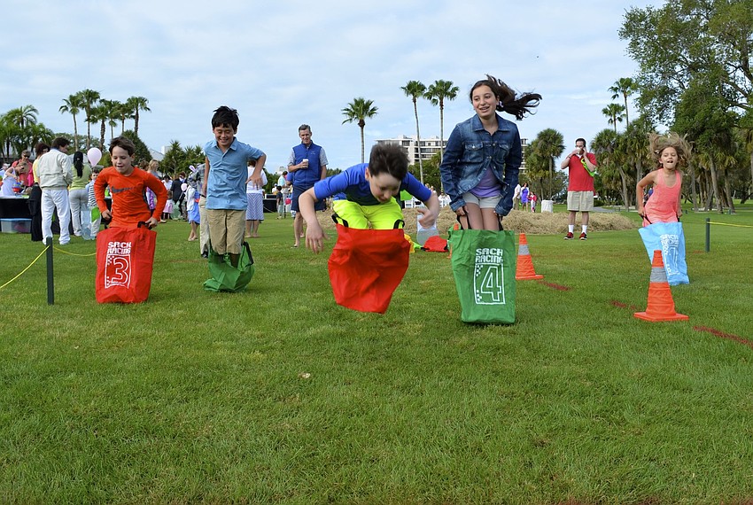 Children participated in sack races throughout the morning.