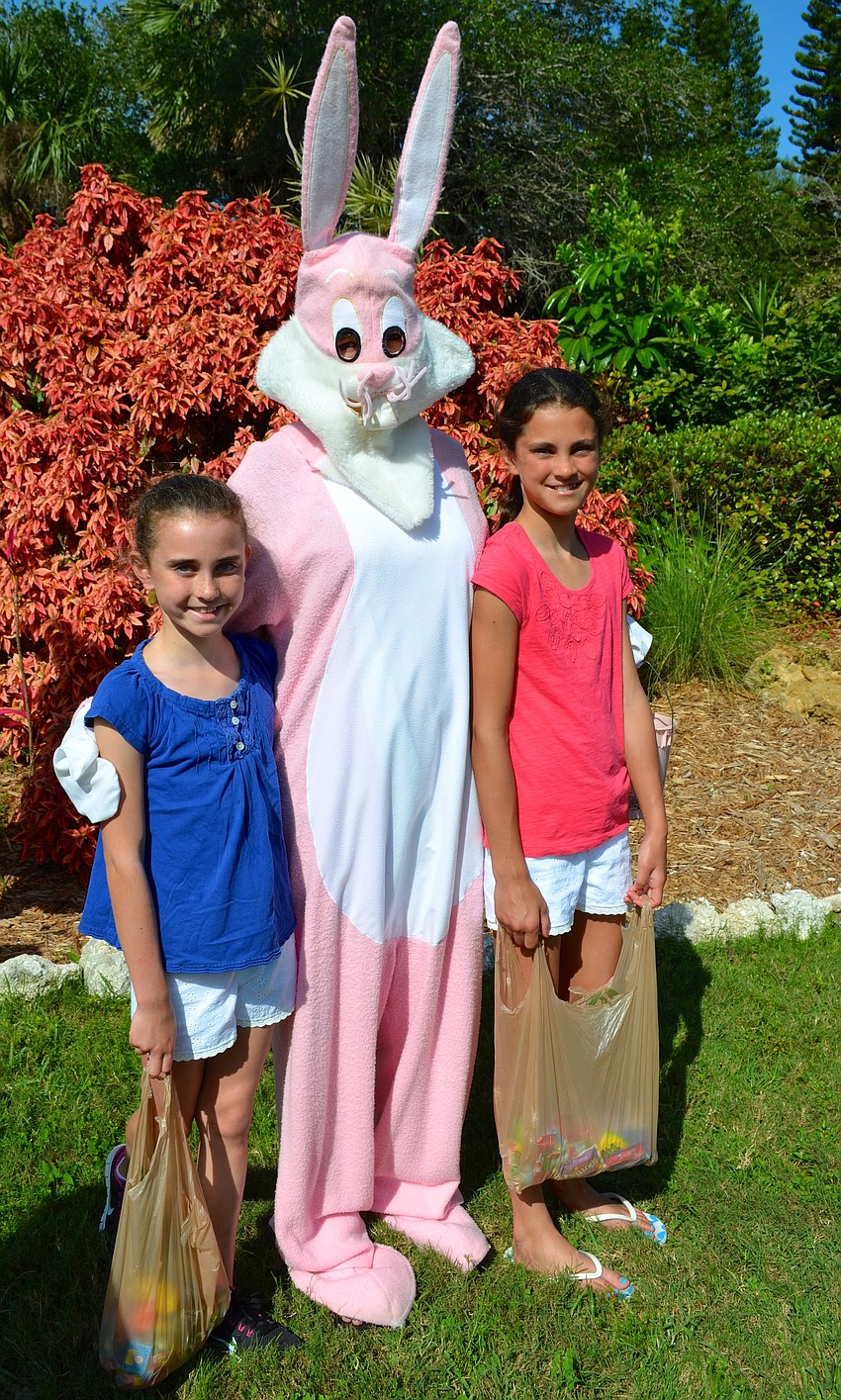 Sophie and Ella Luna pose with the Easter Bunny.