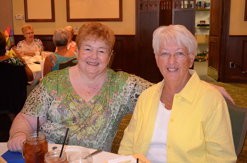 Gal pals Helen Johnson and Maryanne DelDuco enjoy cold beverages.