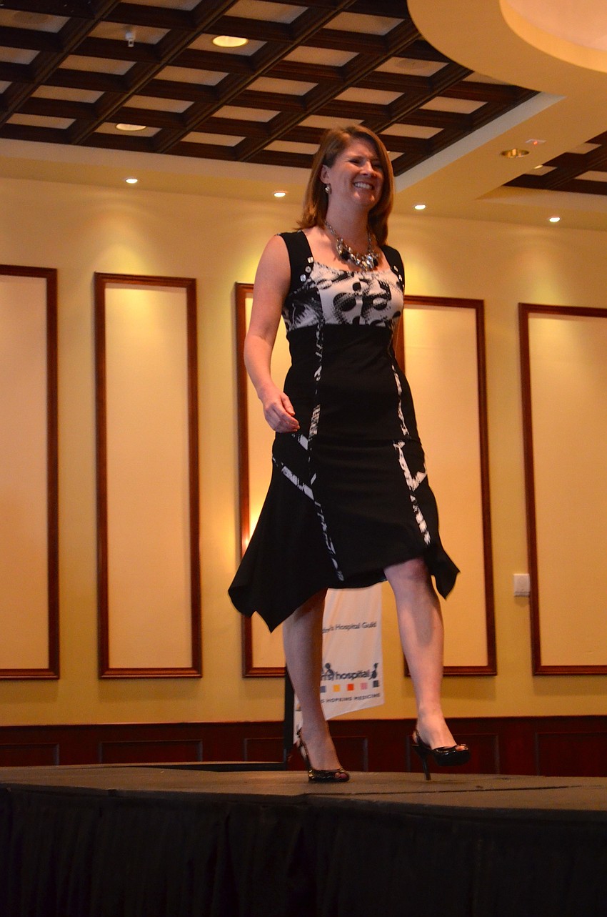 Kara Norcross struts down the runway.