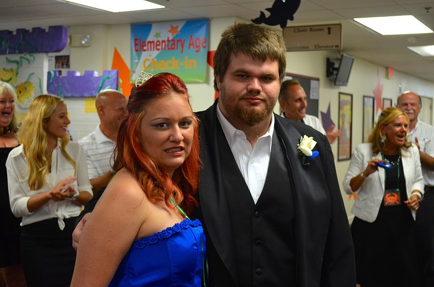 Brittany Ormsby and Jesse Lilly pose for a photo opportunity.