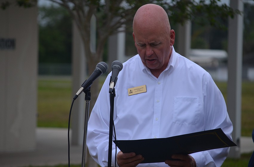 Mayor Shannon Snyder presents the proclamation.