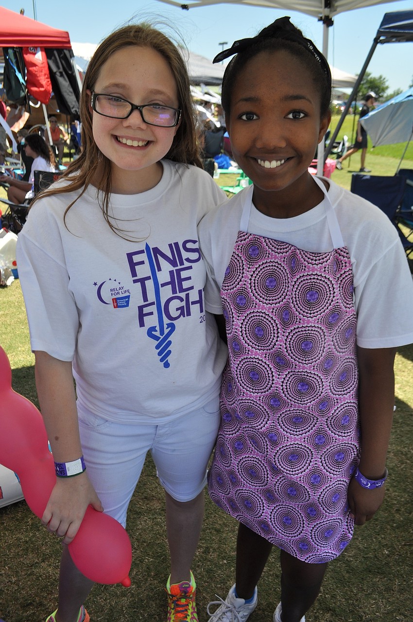 Braden River Middle students Savannah Jordan and Reina Langley show off their teamâ€™s 