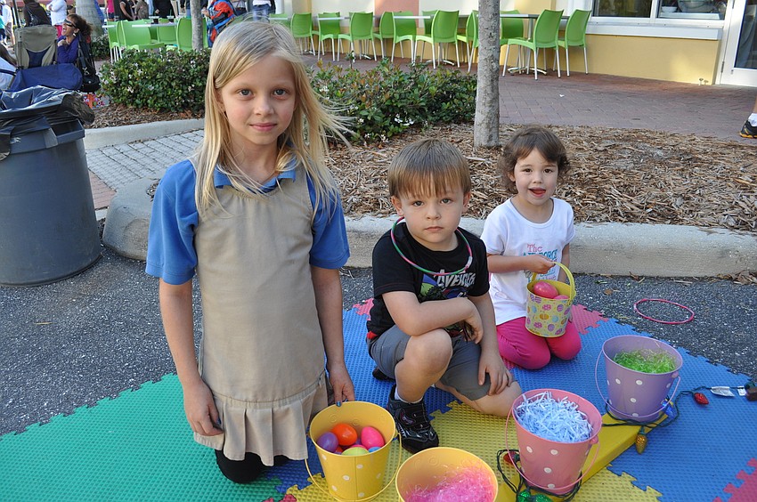 Hailey and Jay Jay Warren and Lauren Temminon found Easter eggs at the Sarasota Baptist Church booth.