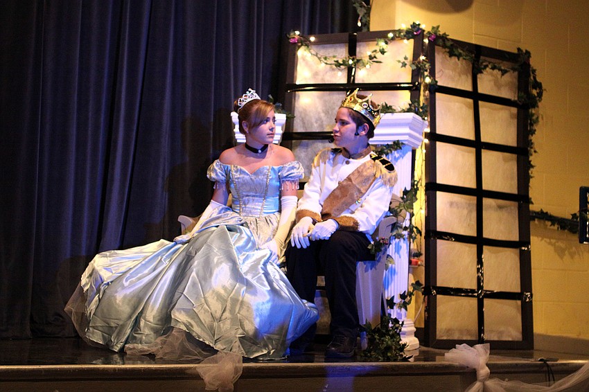 Cinderella, Paige Merriman, and Prince, Kyler Inman, talk outside the ballroom right before midnight strikes.
