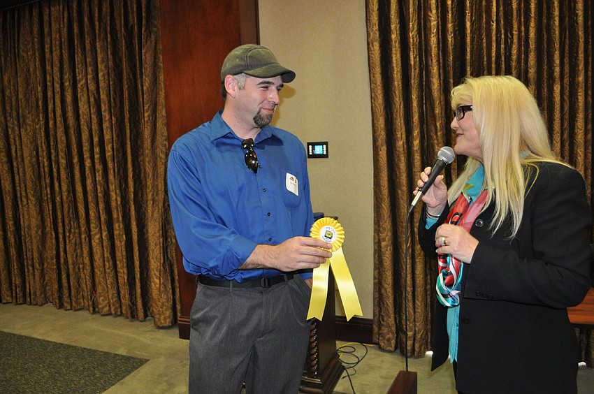 Chris Neumann, a CEO of a beer locating website though he doesnâ€™t enjoy beer, earned a third place award for â€œStashers and Cachers.â€