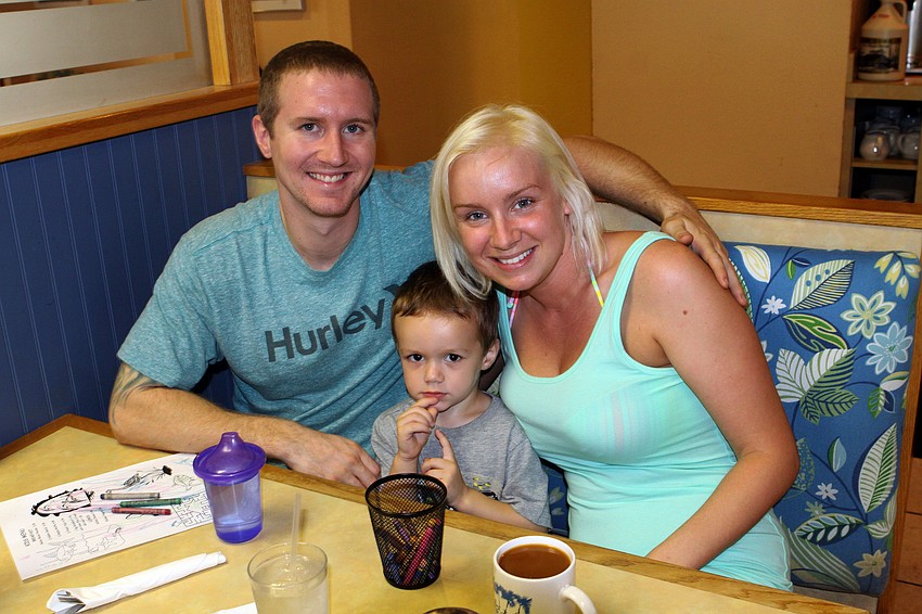Derek Wenzel and Jack Falvey, 2, celebrate Emily DeChaine with brunch at The Blue Dolphin CafÃ©.