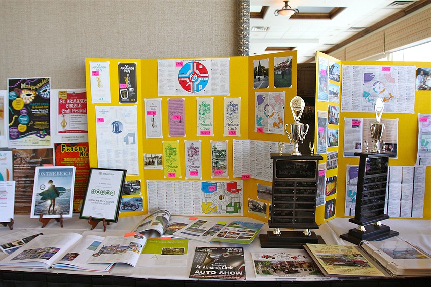 The trophies for the best holiday decorations, boards with former St. Armandâ€™s Circle pamphlets and photos from past events were all on display at the annual meeting.