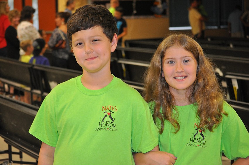 Scott and Carly Baker; Carly is a fourth grader who sang in the chorus with Lexi.