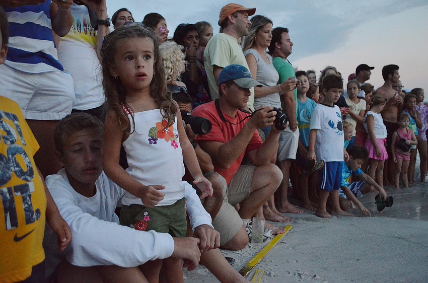 Spectators waiting for the sea turtles to be released.