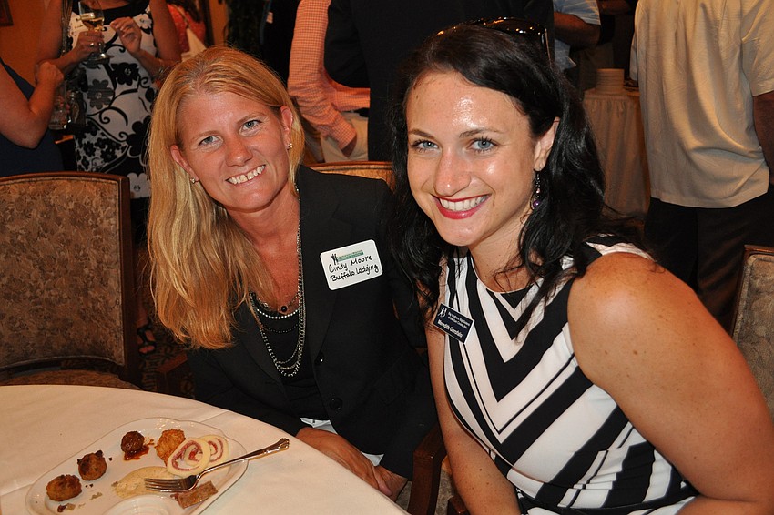Cindy Moore, of Buffalo Lodging, with Meredith Garafolo, of Big Brothers Big Sisters of the Sun Coast
