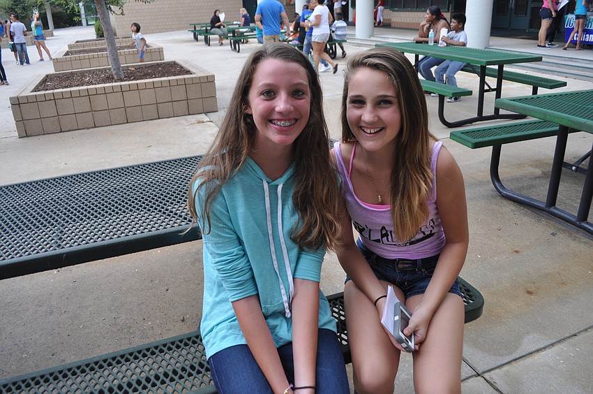 Eighth graders Mackenzie Keller and Sydney Blocker play the violin in the Braden River Middle School orchestra.