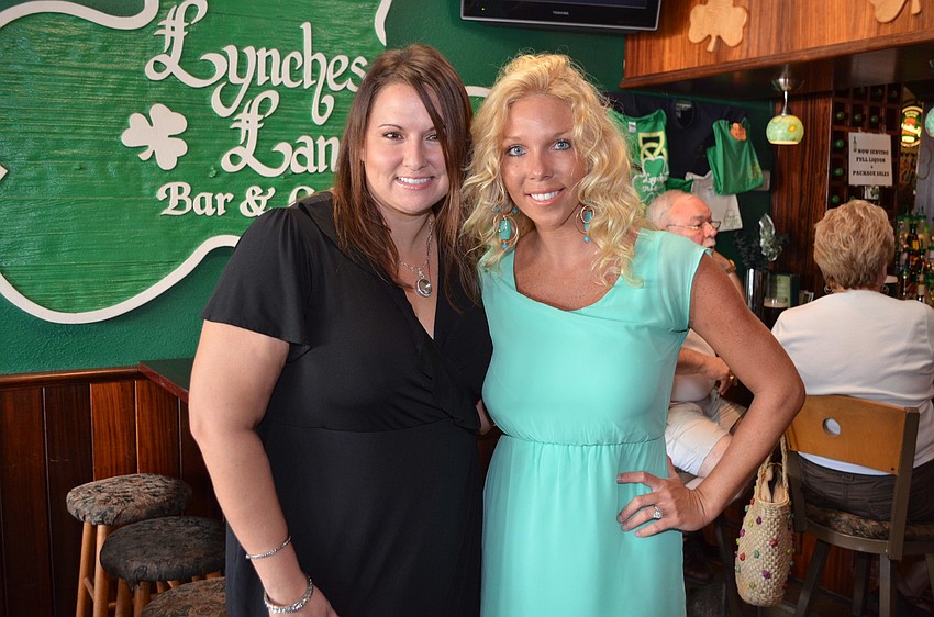 Nicole Brickhouse and Adrian Griffin from Longboat Title Services