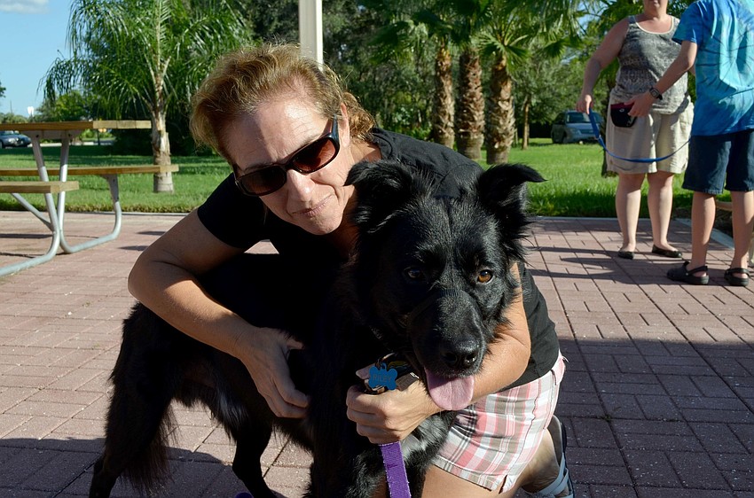 Karen Strauss and her dog, Riley
