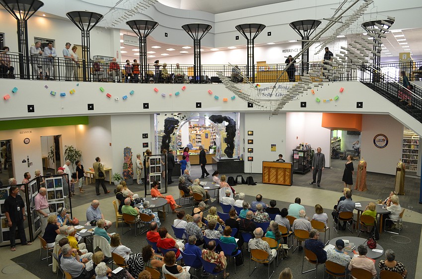 Patrons of the opera and library guests crowded the corridors, wrapped up the stair case and encased the balcony to hear Sarasota Opera artists perform Verdiâ€™s works.