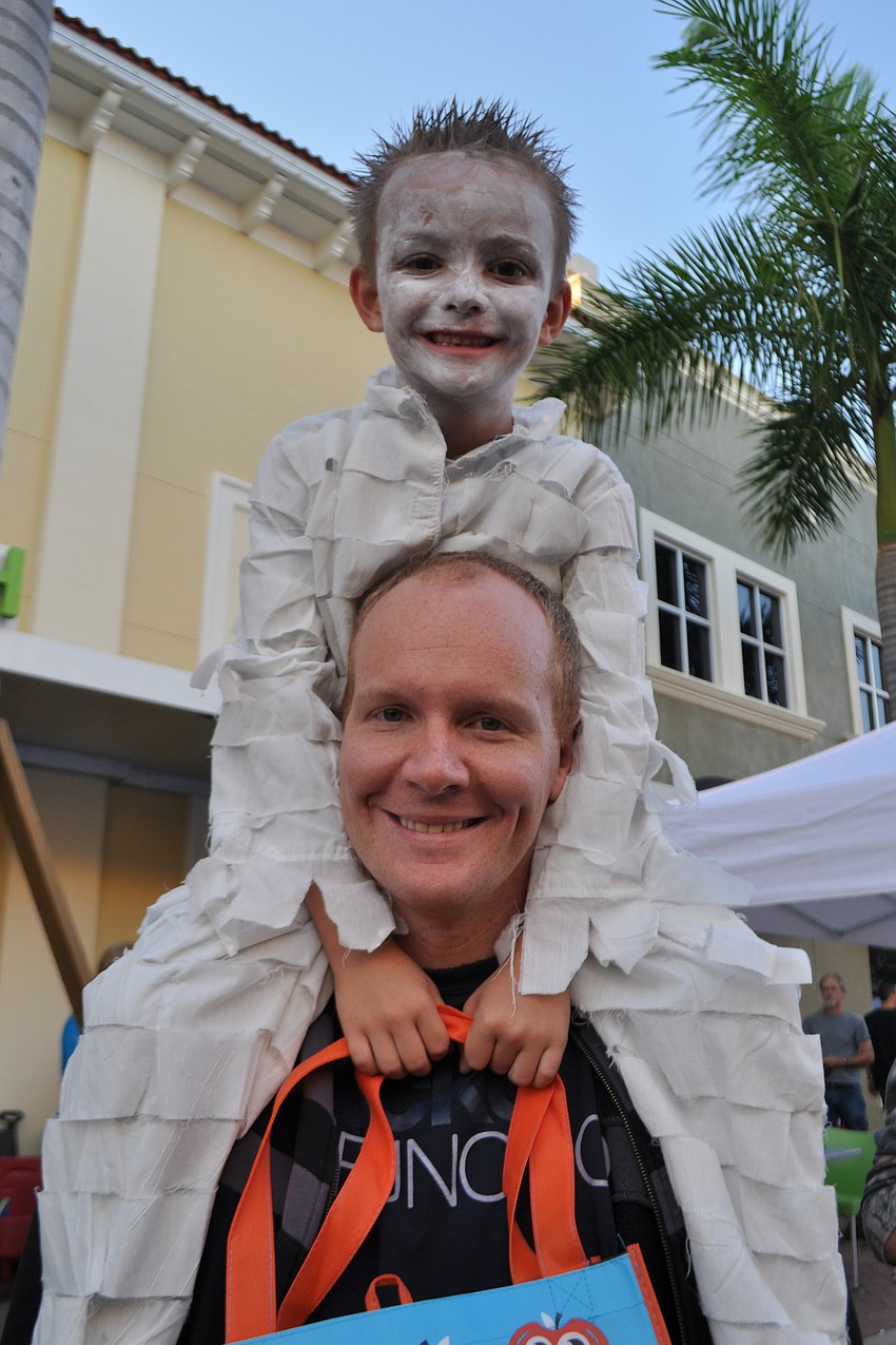 Jordan Judy gave his  son, Gabriel, a birds-eye view of the parade.
