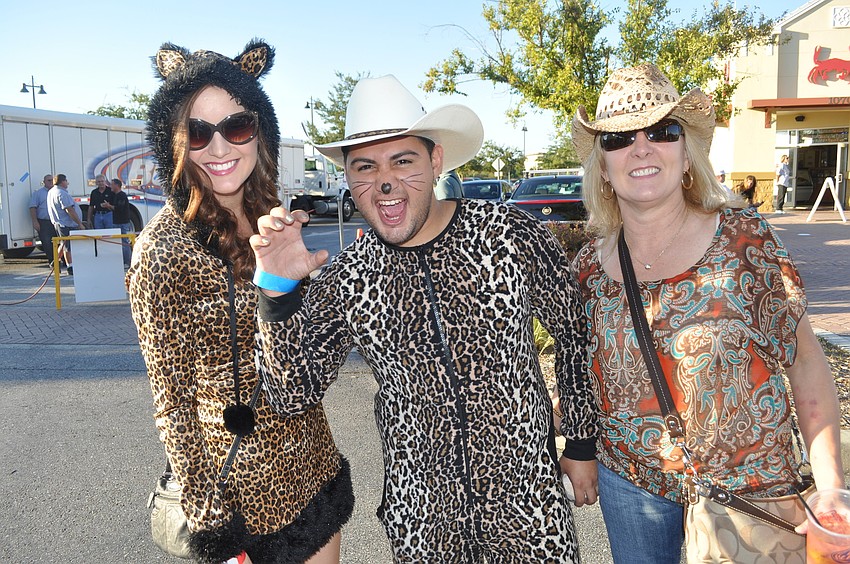 Shelby Carter, Angelo Barea and Patricia Carter enjoyed the Bud Light vanilla bourbon special.