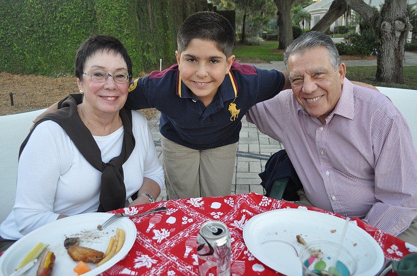 Carol and Vinnie Alesi with their son, Vincent, 10