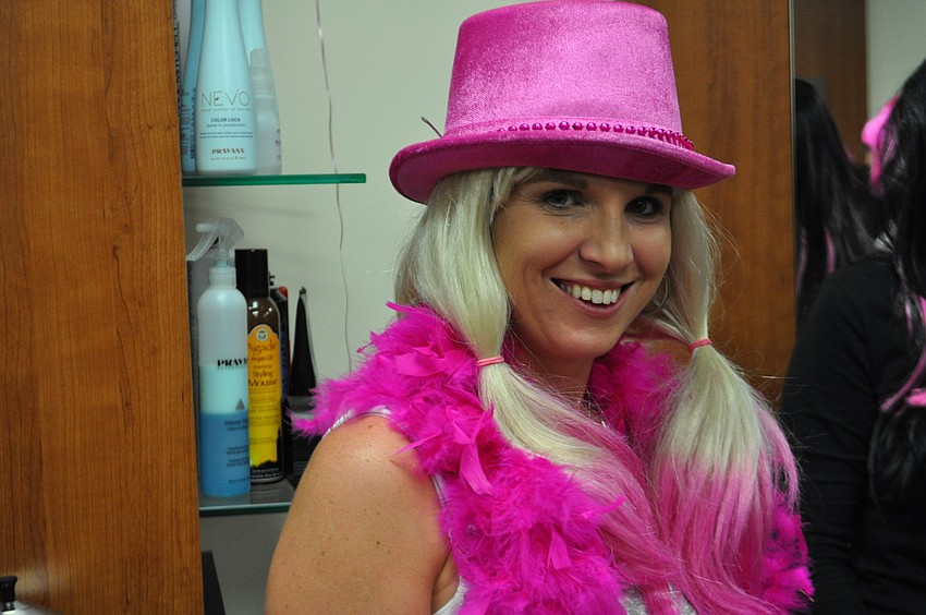 Crystal Reynolds pinks out her ensemble.