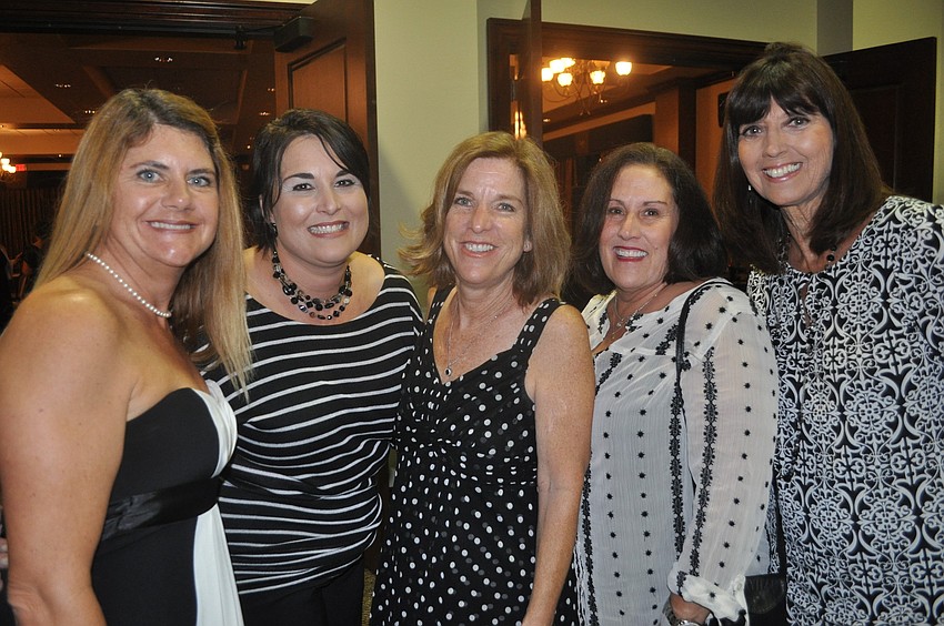 Kristen Chapman, Betsy Smith, Mary Sue Bauer, Jackie Blue and Bonnie Pinkerton â€” who will retire at the end of this year as a McNeal first grade teacher