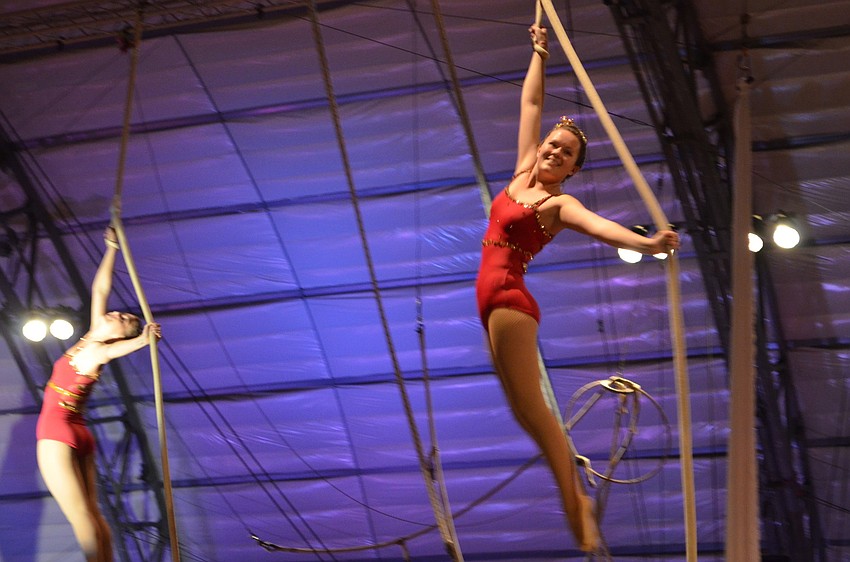 Sailor Circus performers dance on a Spanish web