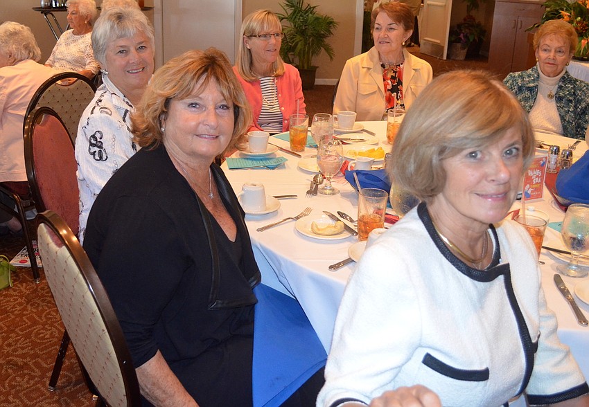 Joy Pendergast, Jane Brown and June Paton await their lunches.