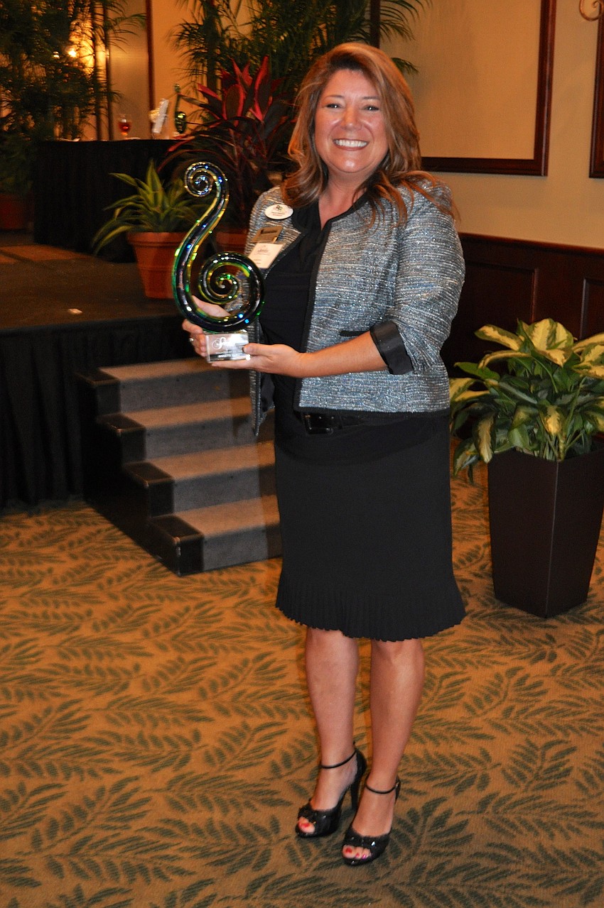 Incoming Chair of the LWRBA Board, Annette Gueli, takes home Volunteer of the Year and Best Rancher awards.