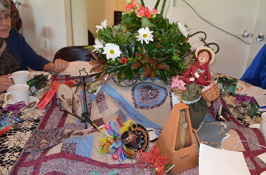 The Sarasota Opera table featured antique items