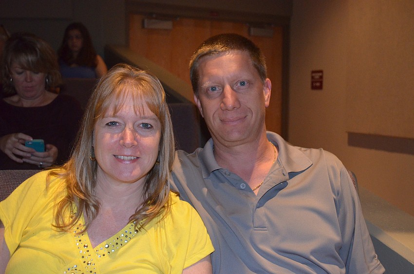 Trichia and Scott Wolfe support Trichiaâ€™s niece Hannah.