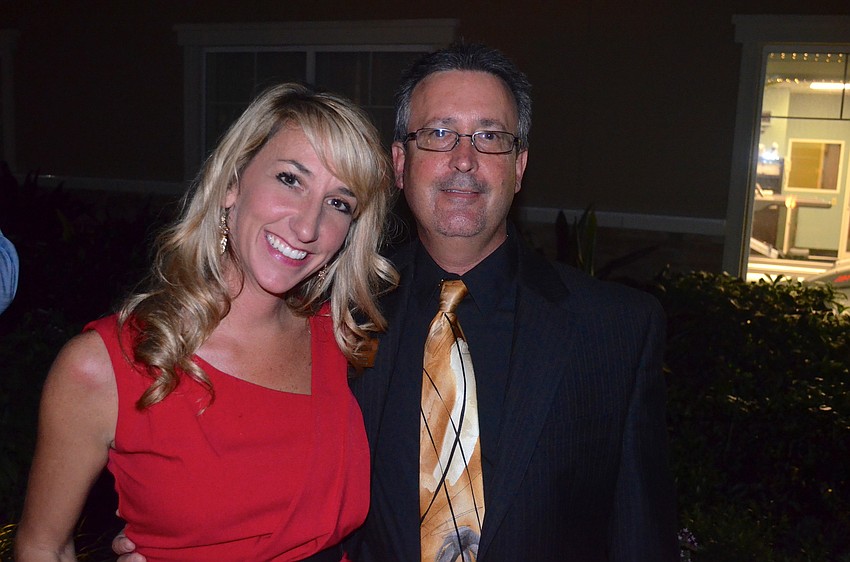 Friends Brooke Marks and Marc Simms make time for socializing.