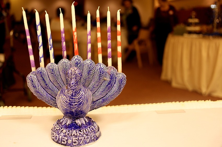 Rabbi Jonathan Katz is the proud owner of a turkey-shaped menorah, also known as a menurky.