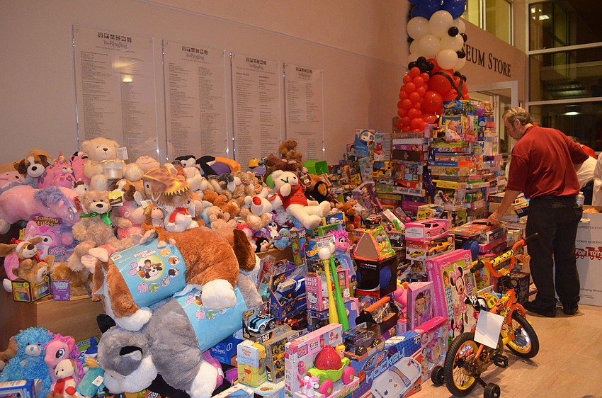 Admission to the evening was one unopened toy per guest