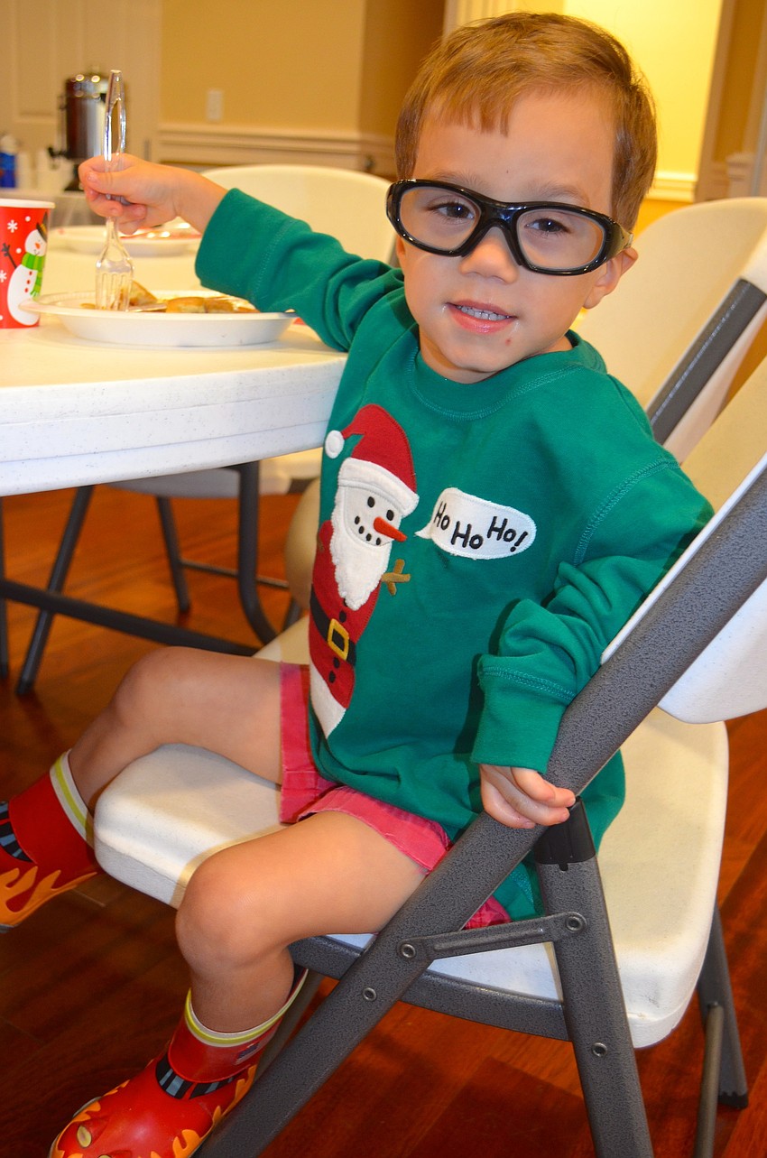 Kade Johnston, 3, enjoys his pancakes.