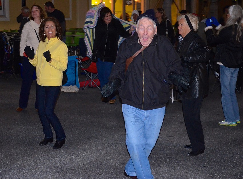 The music convinces patrons to dance to stay warm.