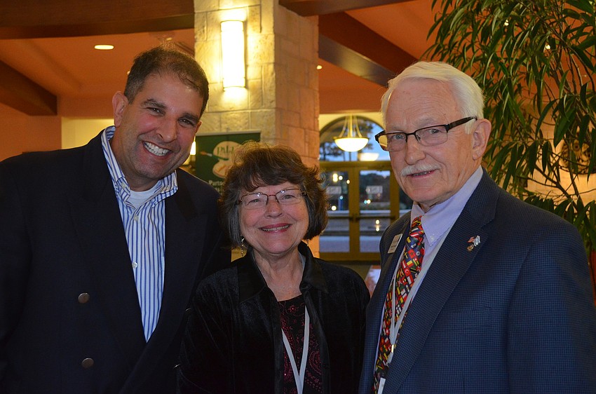 Tom Esselman with Ellen and John Cavanaugh, Perlman board trustee