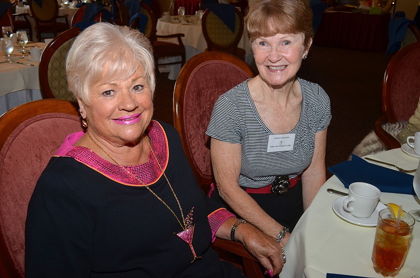Tina Pinho and Nicki Coffaro wait to see the showcase of purses.