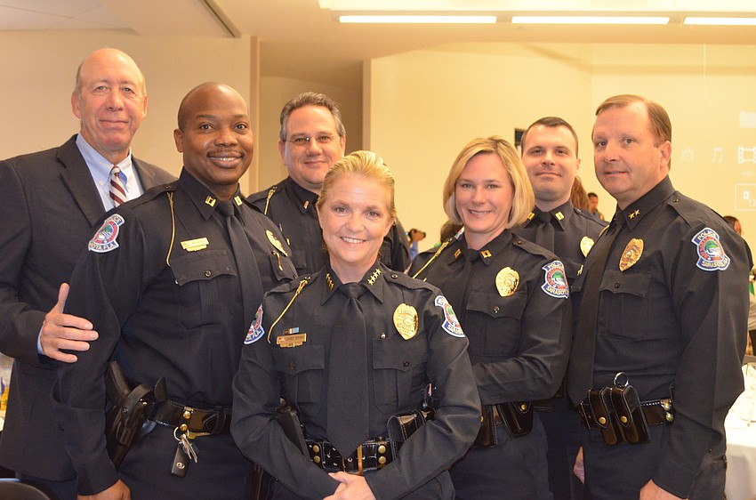 City Manager Thomas Barwin with Capt. Lucius Bonner, Pat Robinson, Sarasota City Police Chief Bernadette DiPino, Capt. Corinne Stannish, Pat Ledwith and Col. Stephen Moyer