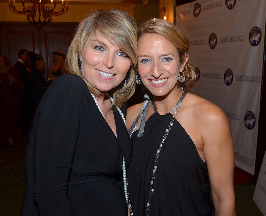 Gal pals Martyna McDonnell and Dawn Martin show off little black dresses.