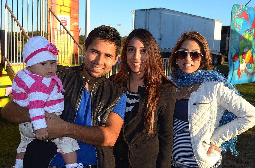 Valentina Reyes, 7 months, Daniel Reyes, Ana Rivera and Annie Talbert.