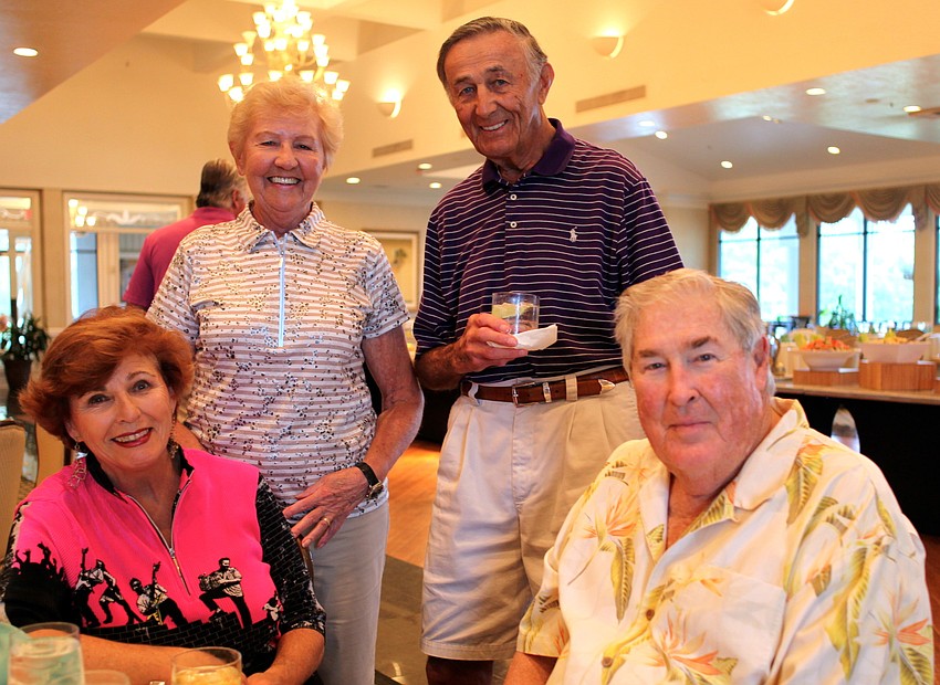 Sitting, Carol and Willam Scarbrough; Standing, Betty and Mike Sarzynski