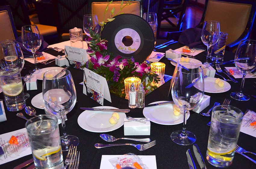 Keeping with the nightâ€™s music theme, the tables were decorated with records.