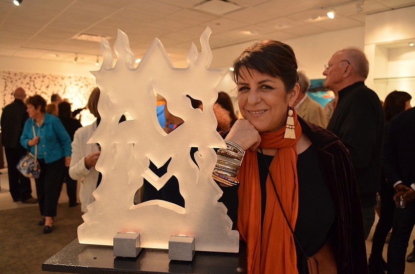 Jill Hoffman-Kowal in front of her husband Dennis Kowal's 