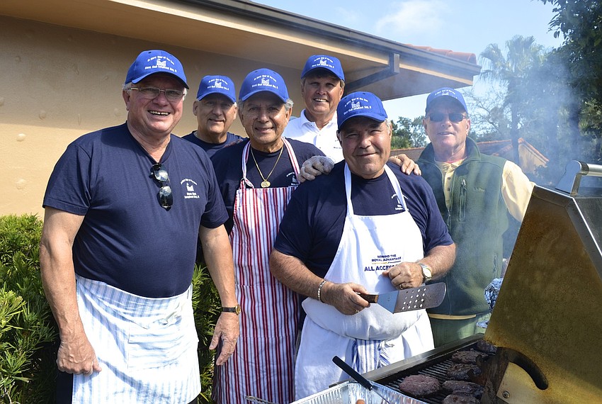 Menâ€™s Club members Dave Carter, Rich Stauffer, Lenny DiStefano, Don Prola, Joe Zampino and Jim McGuire provide a tasty break to the shopping madness.