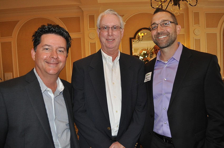 Jeffrey Charlotte and Richard Butler of JE Charlotte Construction Corp. with Mike Tullio of Kroboth and Helm Mortgage Company