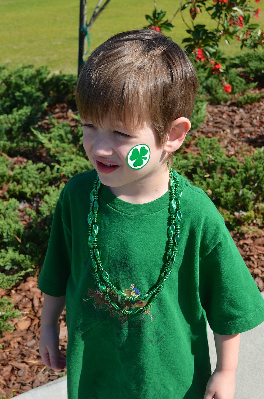 Five-year-old Brent Workman waits for the parade to start.
