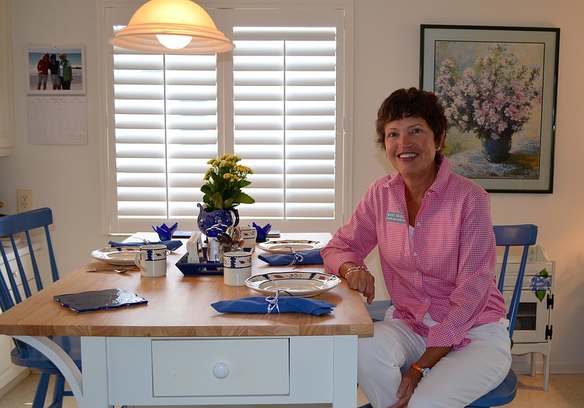 Mary Brandt sits at the island at 540 Spanish Dr. North.