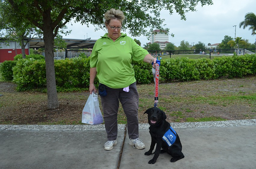 Lisa Karmes walks with Cami.
