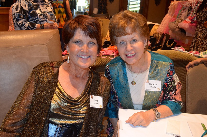 Linda Johnson and MaryLee Danahy take time to socialize.