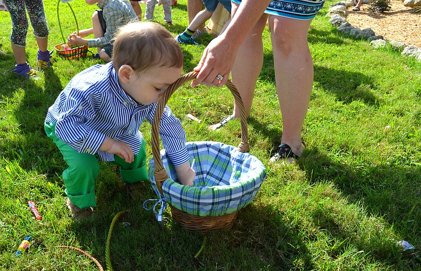 Ryan Hetland adds another piece of candy to his basket.